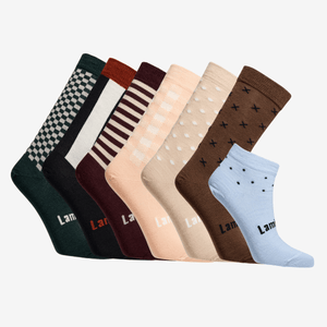 pack of 7 pairs of women's merino socks in various designs and colours
