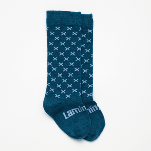 Lamington baby merino knee high socks in deep teal with light blue cross pattern made in New Zealand.