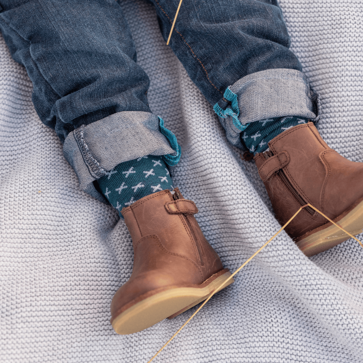 Merino Wool Knee High Socks for Baby in deep blue with soft baby blue cross pattern, cozy and breathable.