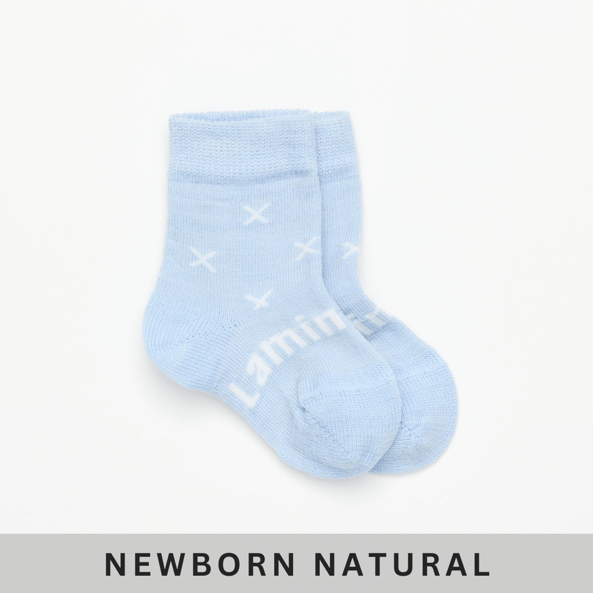 Merino Wool Crew Socks for Baby in Beau, light blue with natural cross pattern for newborns.