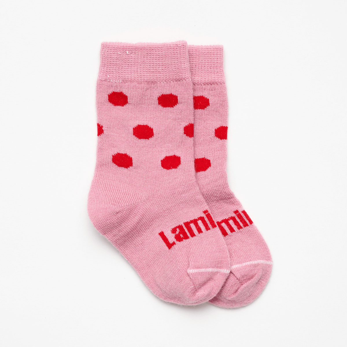 Merino Wool Crew Socks for Baby in pink with red spots, perfect for tiny feet and keeping them warm.