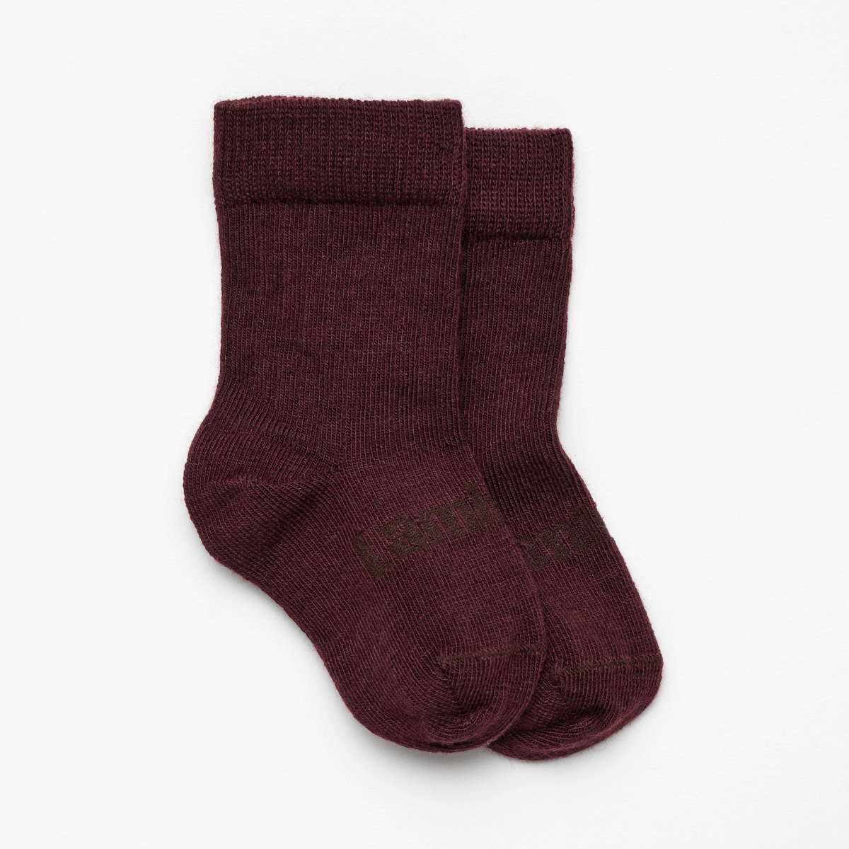 Merino Wool Crew Socks for Baby in Fig - Soft maroon ribbed crew socks for babies.