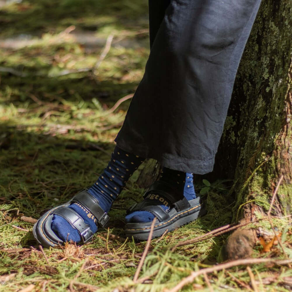 Merino Wool Soft Cuff Crew Socks for Women in navy with yellow dots and soft cuff feature.