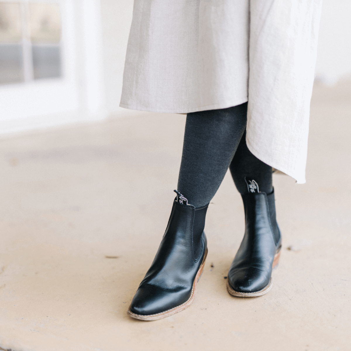 women wearing charcoal merino wool  tights 