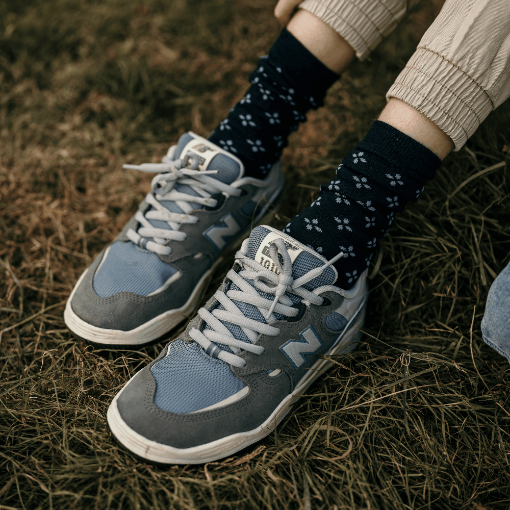 Merino Wool Crew Socks featuring a navy base with light blue tear drop cross pattern, perfect for everyday wear.