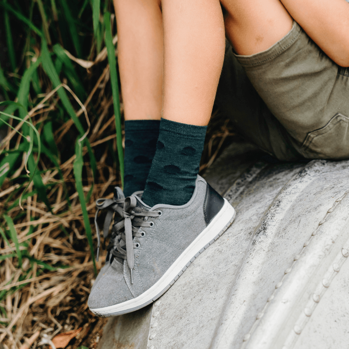 Children's merino wool socks with dark green and navy check pattern 