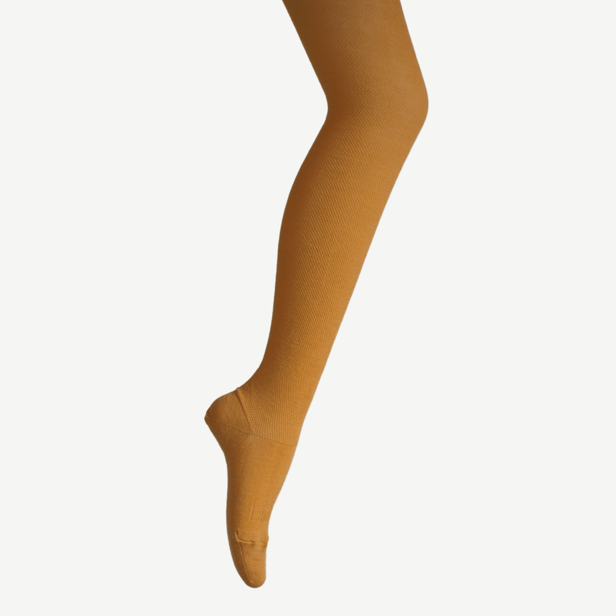Merino Wool Textured Knit Tights in mustard color, showcasing the textured fabric and snug fit.