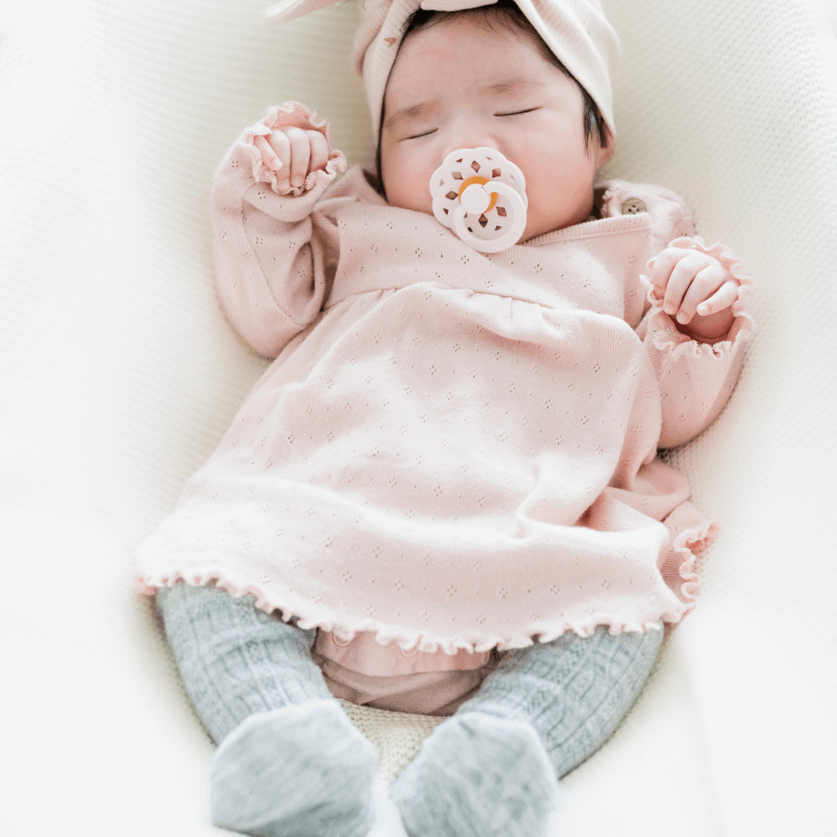 grey marle baby merno wool tights with cable pattern